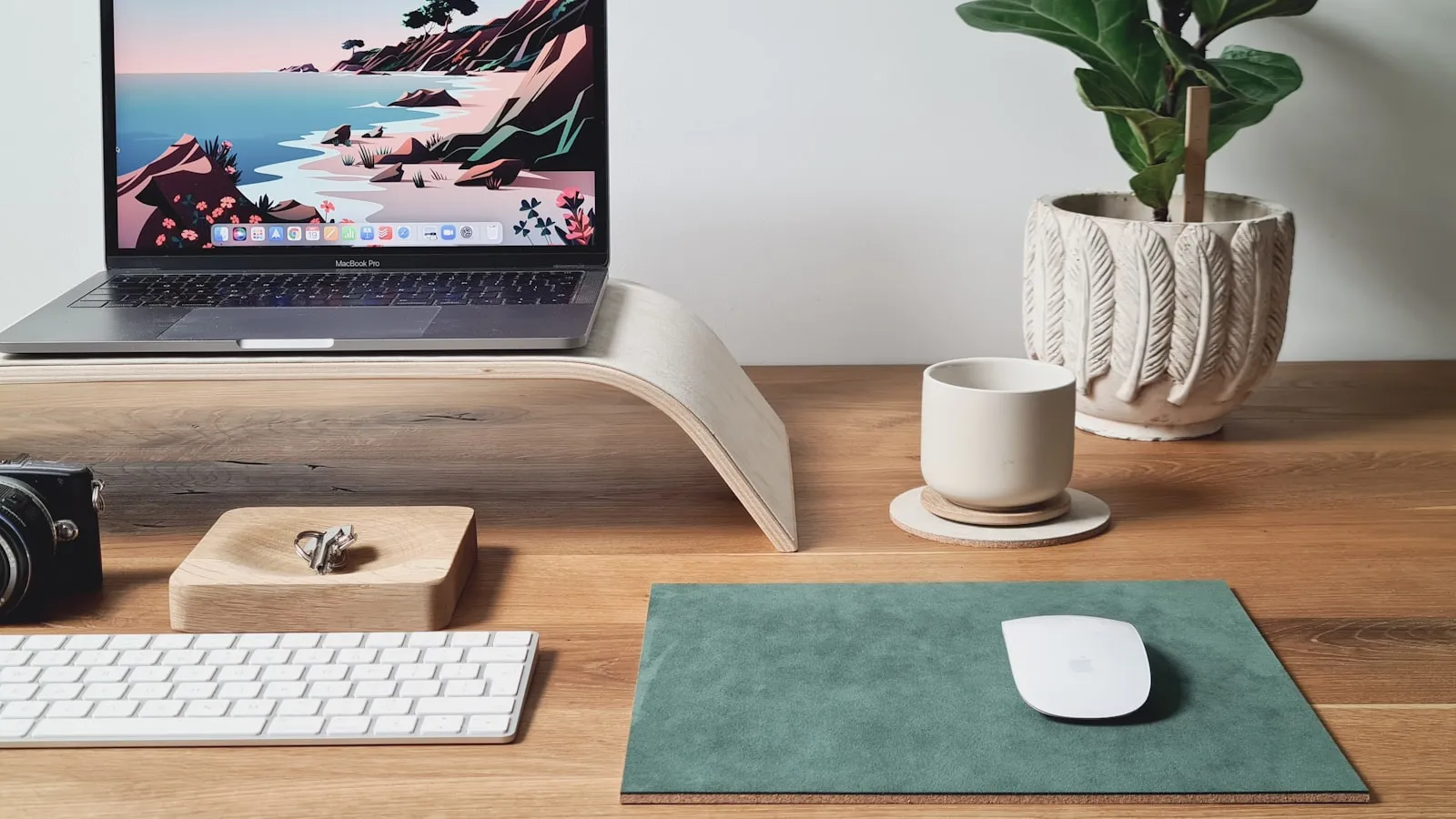 A laptop on a clean desk workspace